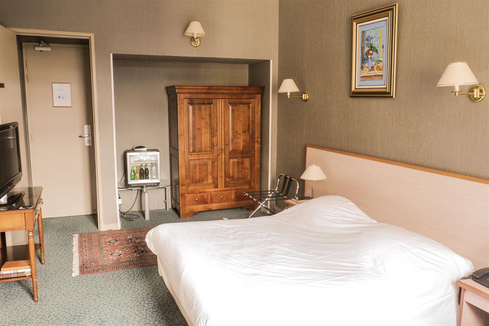 Hotel Terminus Grenoble Rum bild